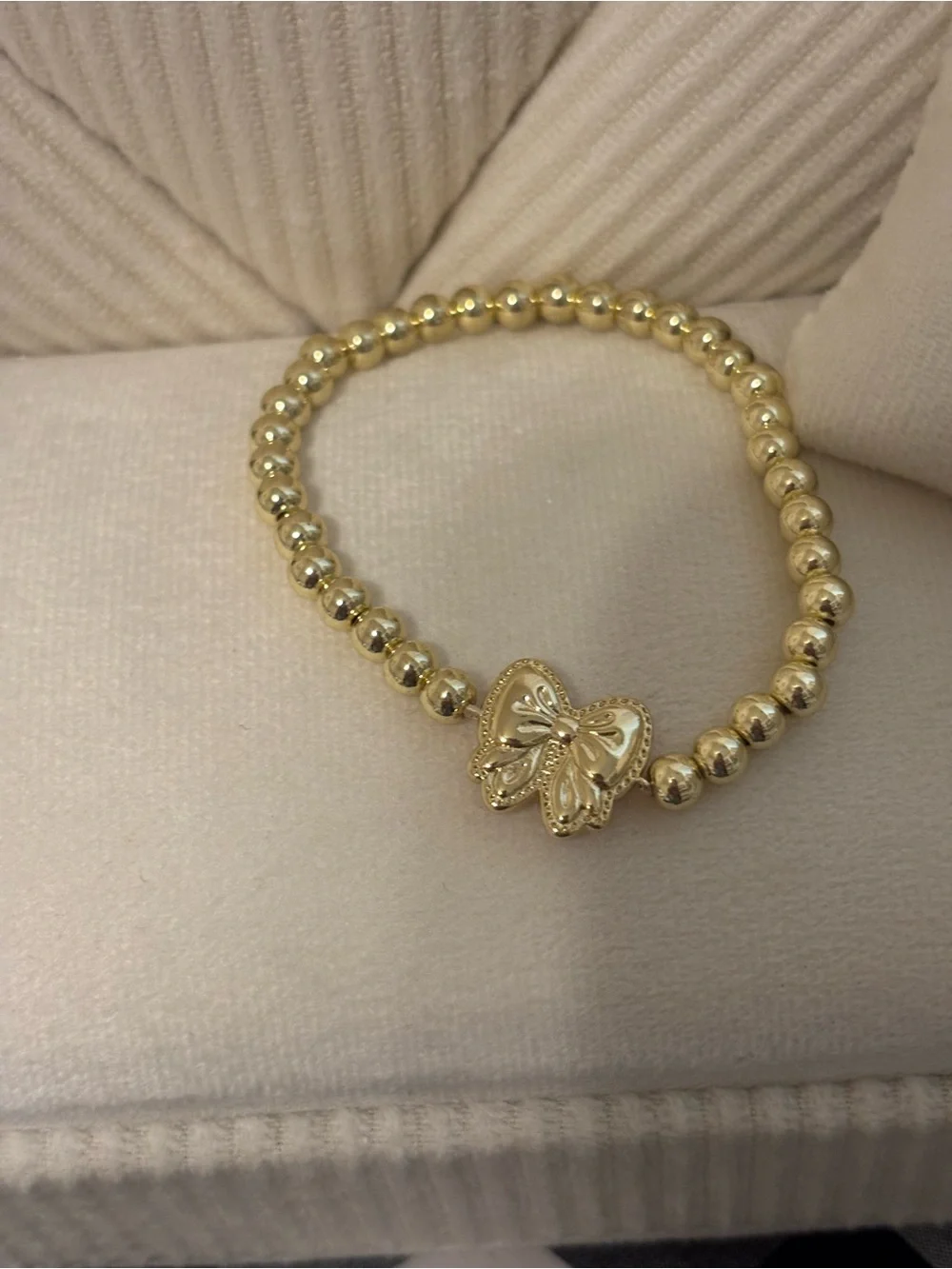 Gold Beaded Bracelet with Pink Butterfly Charm